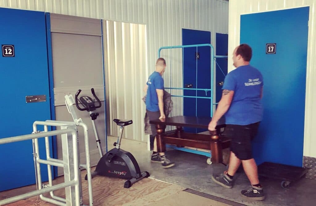 Professional storage facility showcasing organized warehouse with storage containers